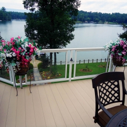White Framed Glass Railing. 2" Fascia Mount Post. Buckskin Lockdry Waterproof Decking.<br> Monitor colors will vary. Request a color sample. G1
