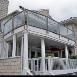 Burnished Slate Frameless Glass Railing. 2" Fascia Mount Post. <br> Monitor colors will vary. Request a color sample. G2FL