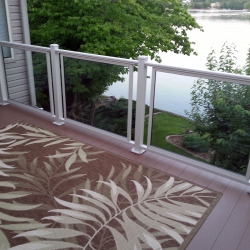 White Framed Glass Railing. 3" Post. Saddle Brown Lockdry Waterproof Aluminum Decking.<br> Monitor colors will vary. Request a color sample. G7