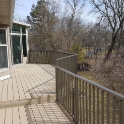Bronze Picket Railing. 2" Fascia Post. Buckskin Nextdeck Decking<br> Monitor colors will vary. Request a color sample. P7