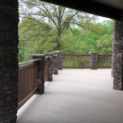 Saddle Brown Traditional Picket Railing. Buckskin Lockdry aluminum decking.<br> Monitor colors will vary. Request a color sample. T16