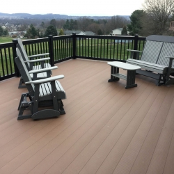 Black Traditional Picket Railing. Saddle Brown Lockdry aluminum decking.<br> Monitor colors will vary. Request a color sample. T17