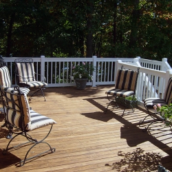 White Traditional Picket Railing. Buckskin Lockdry aluminum decking.<br> Monitor colors will vary. Request a color sample. T3