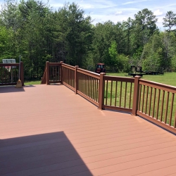 Saddle Brown Traditional Picket Railing. Saddle Brown Lockdry aluminum decking.<br> Monitor colors will vary. Request a color sample. T5